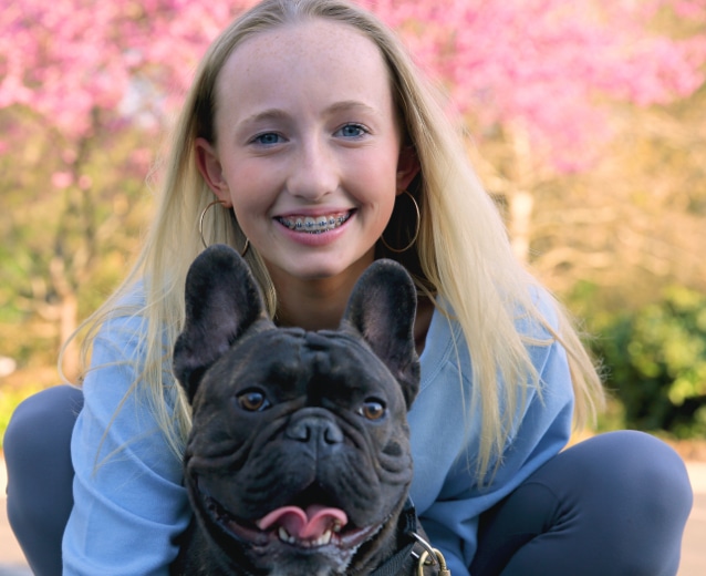 Teen and her dog Kaitlin McClure Orthodontics in Arcadia, CA